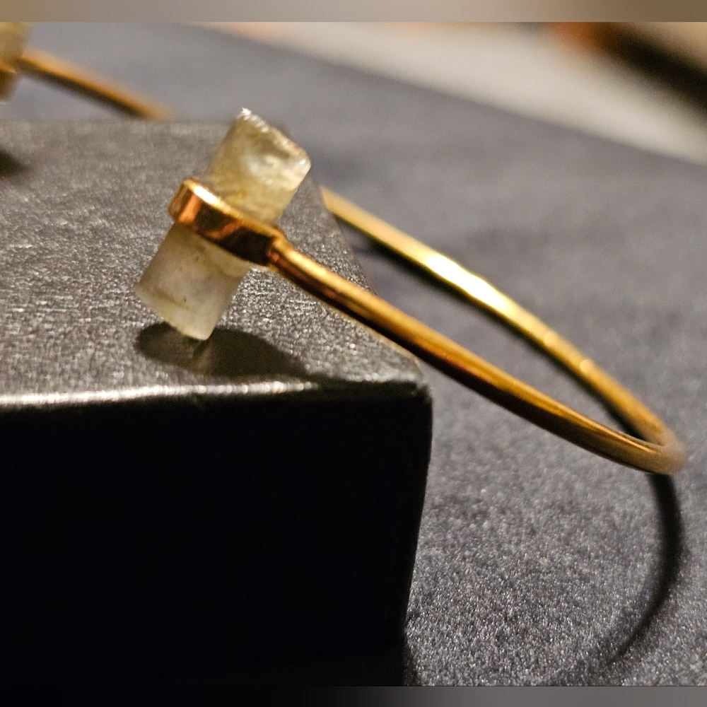 Gold-plated silver bangel with moonstone gemstones at each end